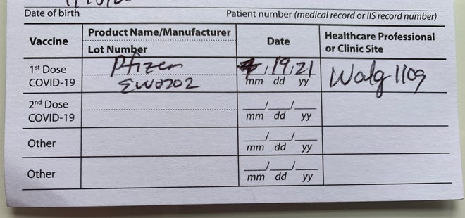 Close-up of a CDC COVID-19 vaccination card, showing the two lines at the bottom that can be used to document booster doses, should they become available.