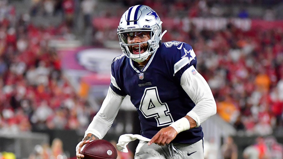 Dak Prescott #4 of the Dallas Cowboys carries the ball during the second quarter against the Tampa Bay Buccaneers at Raymond James Stadium on September 09, 2021 in Tampa, Florida.