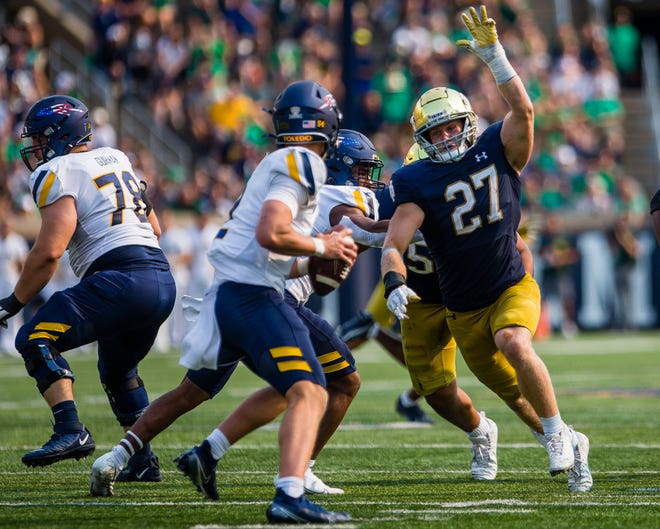 Notre Dame’s JD Bertrand (27) chases down Toledo's Carter Bradley (2) during the Notre Dame vs. Toledo NCAA football game Saturday, Sept. 11, 2021 at Notre Dame Stadium in South Bend.
