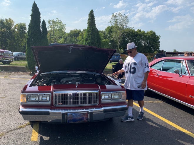 Eddie Garza of Indianapolis brings a beloved 1989 Mercury Grand Marquis to the United Auto Worker Local 933's Car and Truck Show.  Annual event raises money for Indy Honor Flight, a nonprofit funding senior veterans' visit to memorials in Washington, DC