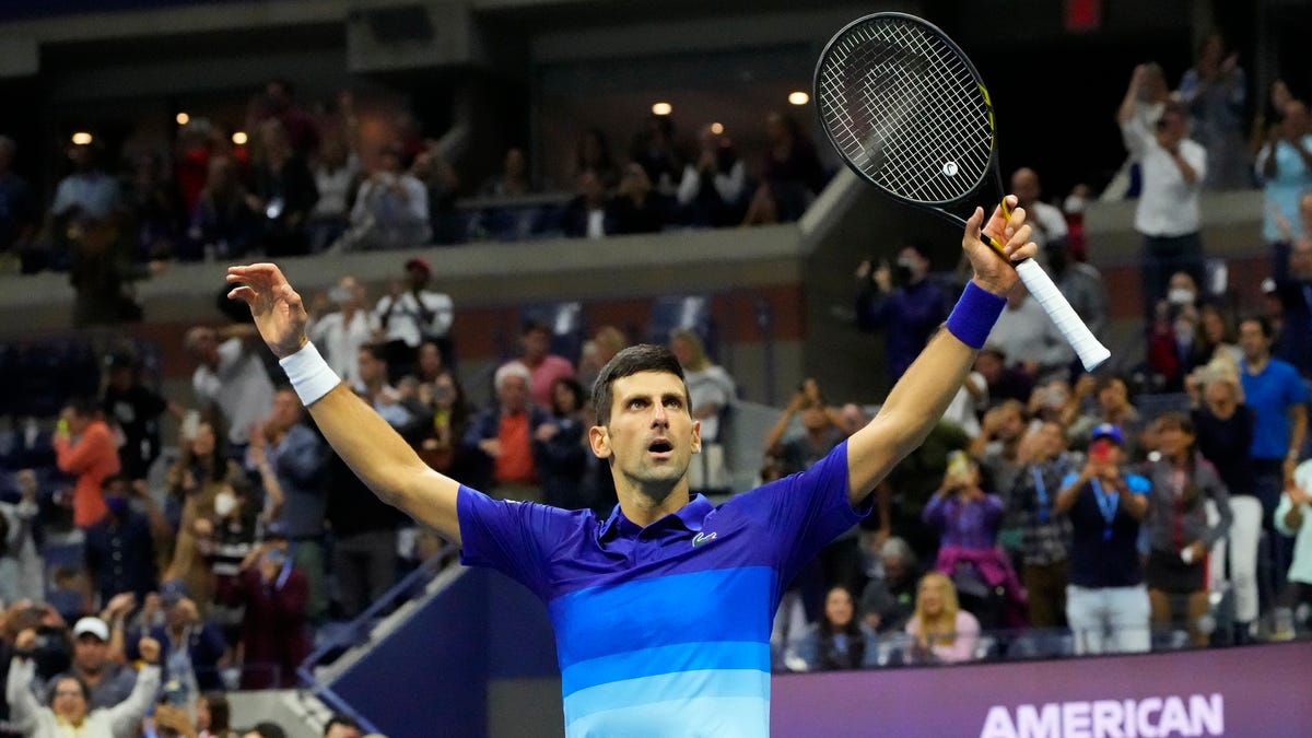 Novak Djokovic celebrates after match point against Alexander Zverev in the U.S. Open semifinals.