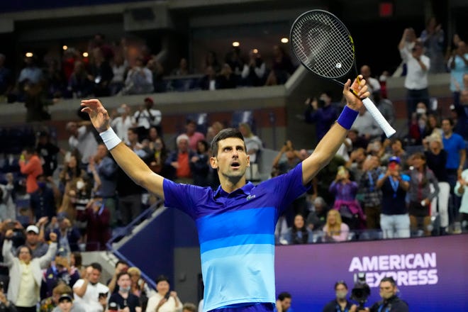 Novak Djokovic celebrates after match point against Alexander Zverev in the US Open semi-finals.