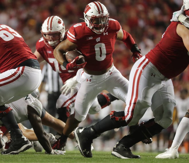 Wisconsin running back Braelon Allen (0) finds a seam during the fourth quarter of their game Saturday, September 11, 2021 at Camp Randall Stadium in Madison, Wis. Wisconsin beat Eastern Michigan 34-7.