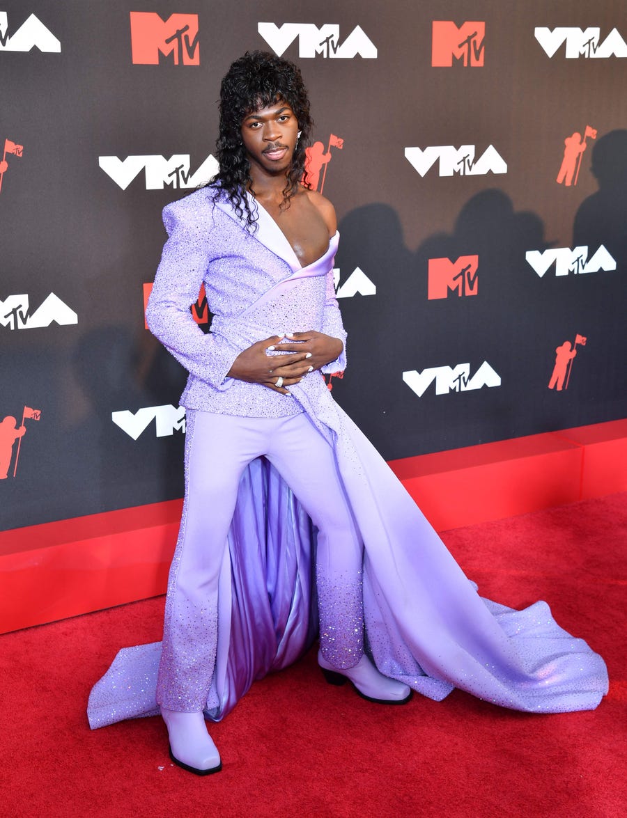 The glitz and glam are back as top musicians descend on New York City for the 2021 VMAs. Rapper Lil Nas X walked the red carpet to kick off the must-see fashion we've come to expect from the MTV awards show.