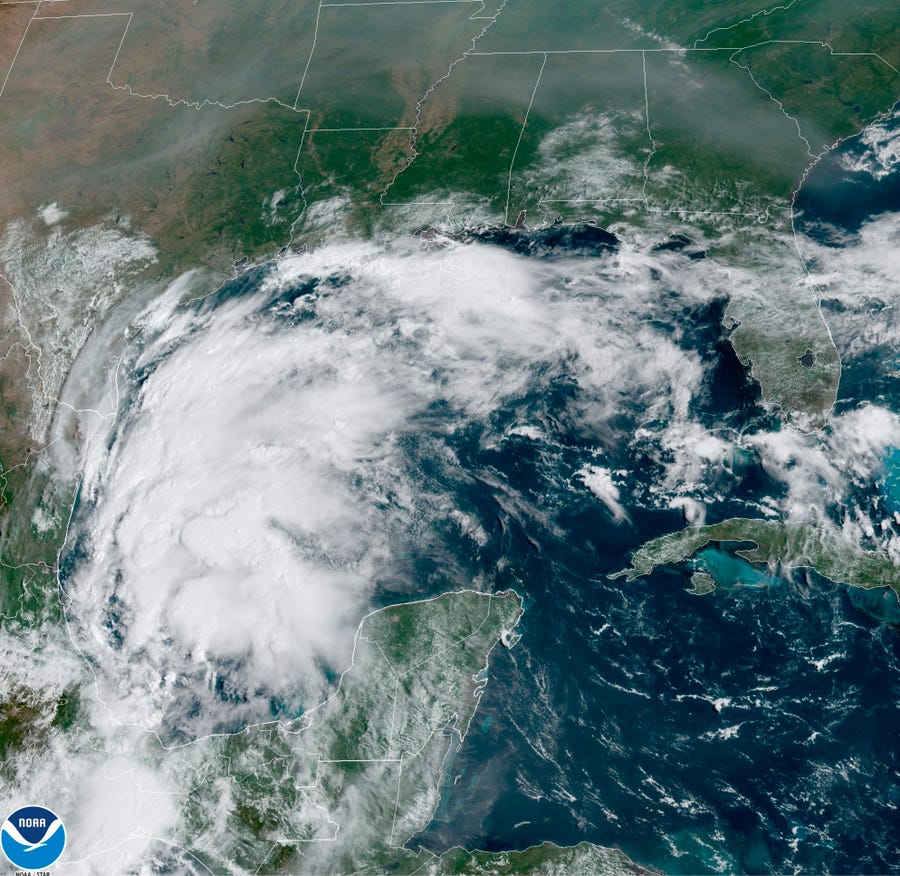 This satellite image provided by NOAA shows Tropical Storm Nicholas in the Gulf of Mexico on Sunday, Sept. 12, 2021. Tropical storm warnings have been issued for coastal Texas and the northeast coast of Mexico.
