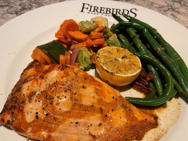 The Grub Spouse feasted on the wood-grilled salmon with a veggie medley and green beans at Firebirds Wood Fired Grill.