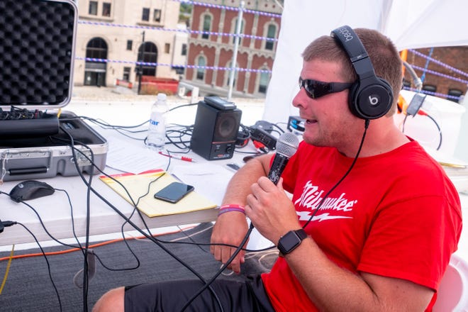 Q Country 107 WSAQ host Matt Markham broadcasts live from the roof of the Michigan Mutual building during the Community Roof-Sit for Kids' Rooftop Rally Tuesday, Sept. 17, 2019, in downtown Port Huron.