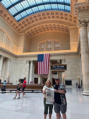 Mac and Barbara Hogle of St. Augustine took The Record along when visiting the Great Hall at the Chicago Union Station. The Station is the size of nearly 10 city blocks and is the third busiest rail terminal in the United States. 