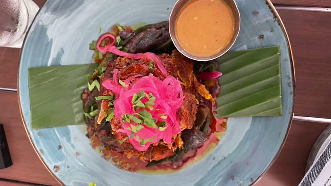 The Cochinita Pibil at Frontera Cocina in Disney Springs is a meal that our food experts say you cannot miss.