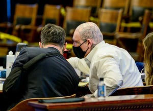 James Michael Parker speaks to his defense attorney Sam Aarab during witness testimony on Tuesday, September 14, 2021.  Parker is accused of deliberate homicide for the death of Lloyd Geaudry who was killed during a street fight in the early morning hours on March 23, 2018, near Great Falls High School.