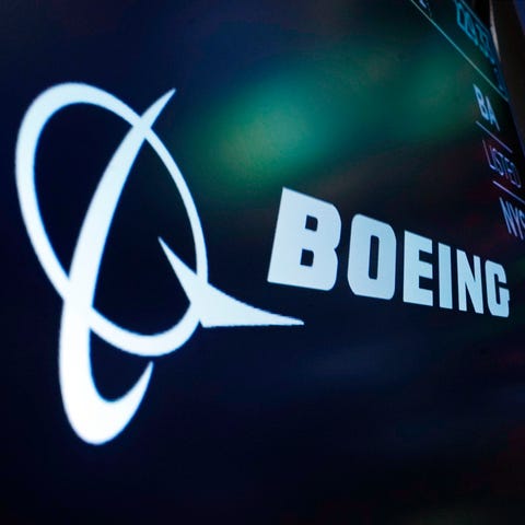 The logo for Boeing appears on a screen above a tr