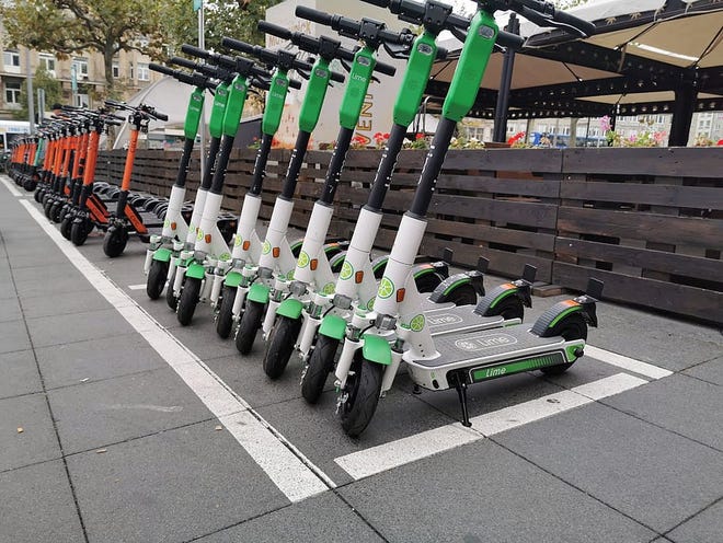 A stock photo shows e-scooters lined up and ready for use. Springfield's city council discussed adding a fleet of electronic scooters to the city at a Tuesday meeting.