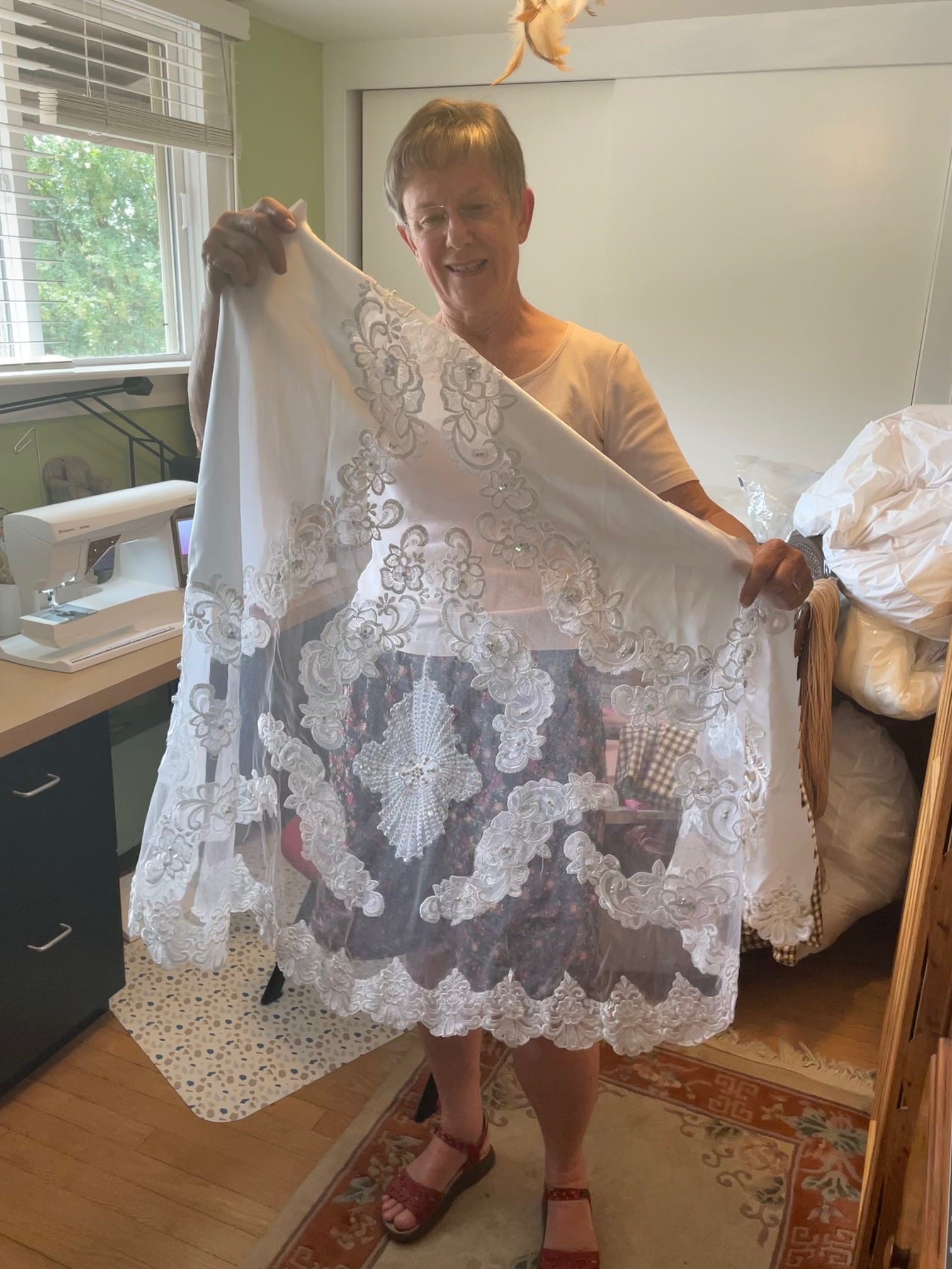 Beautiful, tiny burial gowns made from repurposed bridal dresses