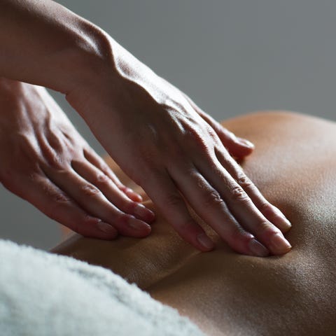 Woman receives massage.