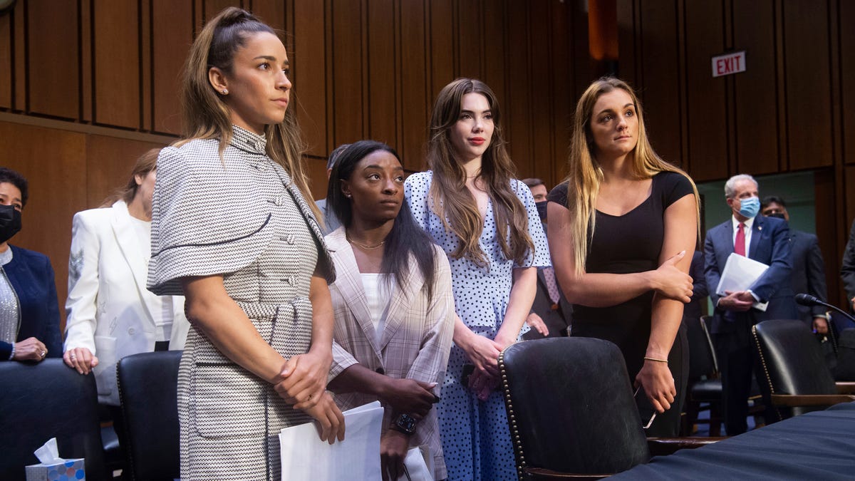 United States gymnasts from left, Aly Raisman, Simone Biles, McKayla Maroney and Maggie Nichols, leave after testifying at a Senate Judiciary hearing about the Inspector General's report on the FBI's handling of the Larry Nassar investigation on Capitol Hill, Wednesday, Sept. 15, 2021, in Washington. Nassar was charged in 2016 with federal child pornography offenses and sexual abuse charges in Michigan. He is now serving decades in prison after hundreds of   girls and women said he sexually abused them under the guise of medical treatment when he worked for Michigan State and Indiana-based USA Gymnastics, which trains Olympians. (Saul Loeb/Pool via AP) ORG XMIT: WX427