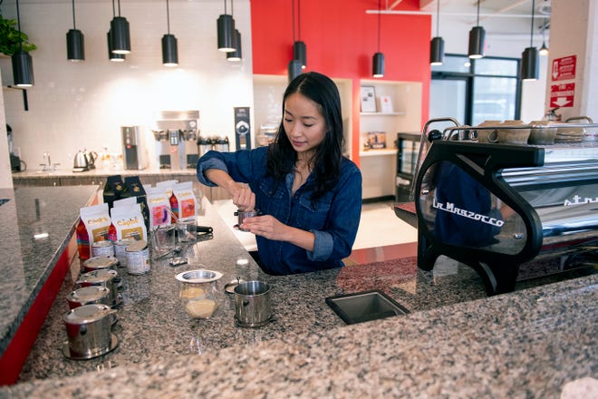 Thu Pham brews Vietnamese style coffee at Caphe Roasters in Philadelphia, Pa.