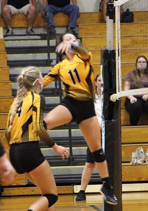 Keyser Summer Reid prepares to strike the ball against Fort Hill on Thursday. Reid was one of several players who showed up big in Keyser's win over the Sentinels.