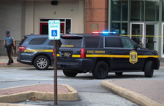 Police investigate after a person was injured by gunfire in Concord Mall Friday afternoon, Sept. 17, 2021.