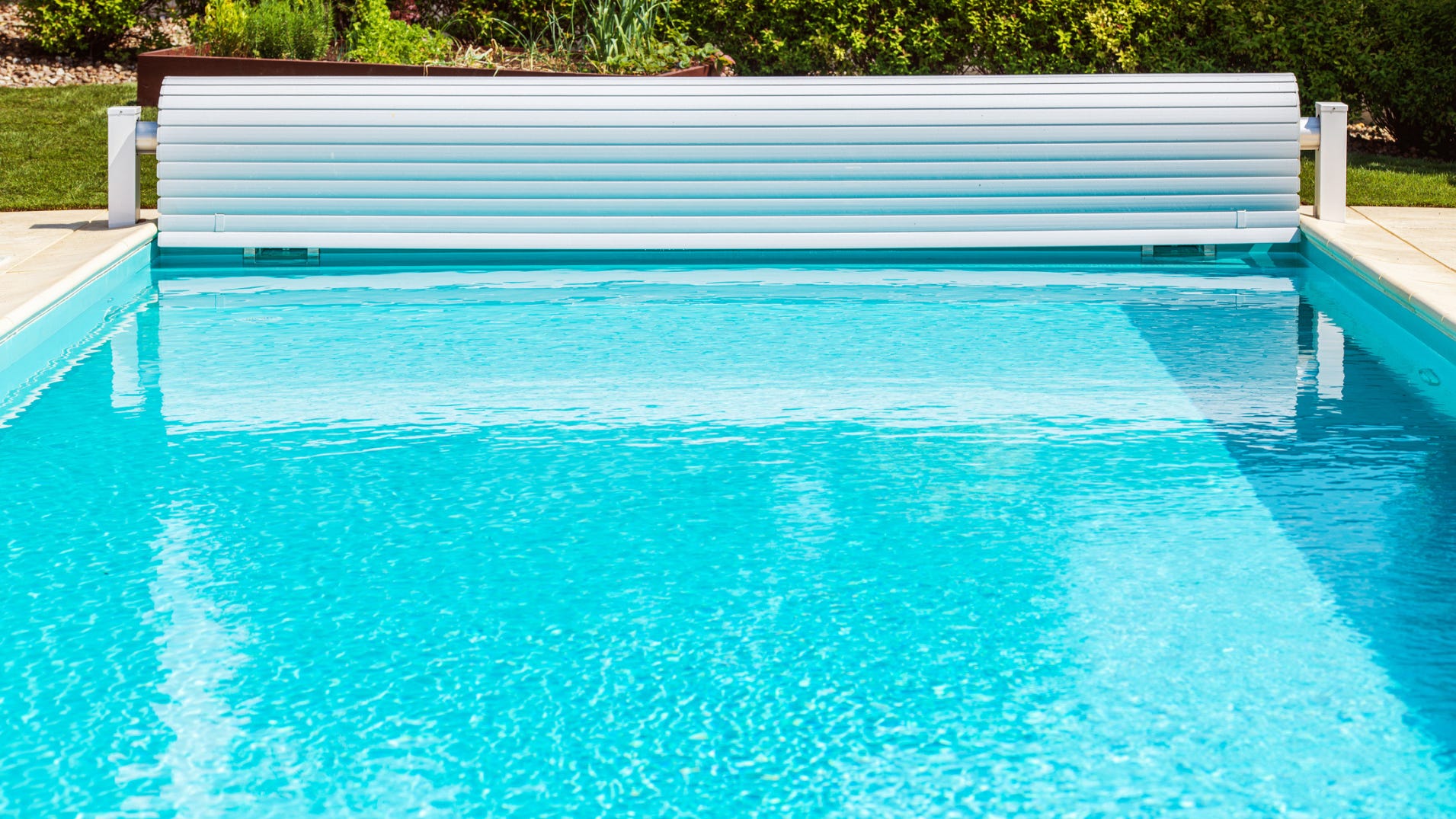 10 pool covers to protect your backyard oasis before winter sets in