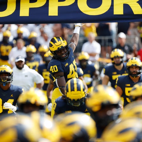 Michigan players take the field prior to the game 