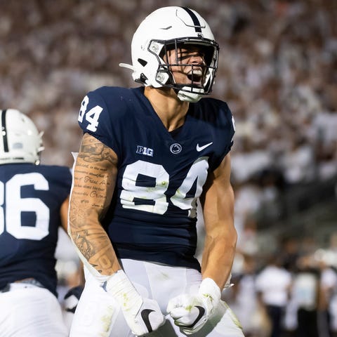 Penn State's Theo Johnson reacts after picking up 