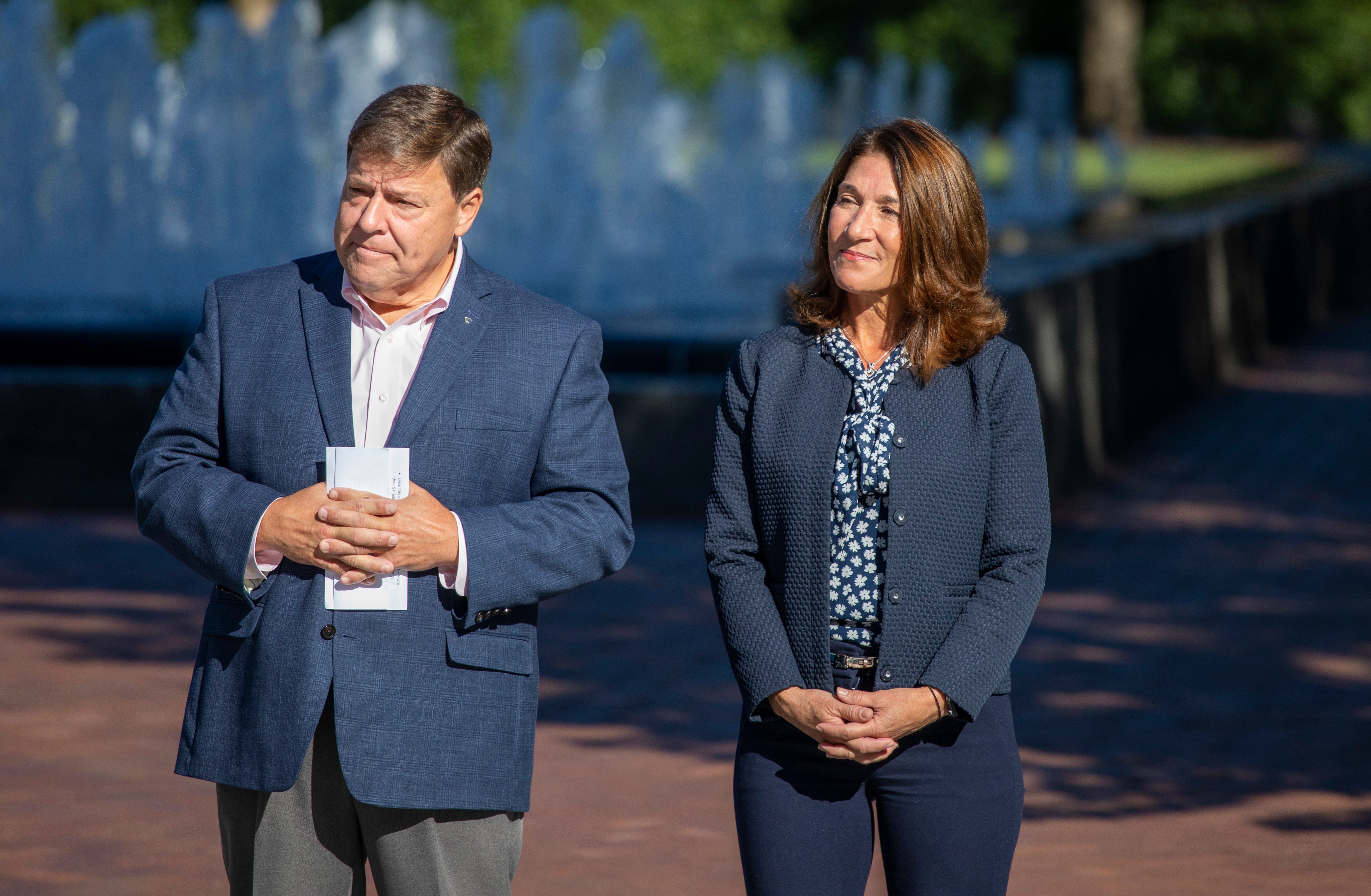 Quincy Mayor Thomas Koch, left, stands with Lt. Gov. Karyn Polito on the Hancock-Adams Common on Sept. 20, 2021.