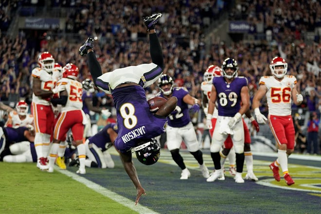 Baltimore Ravens quarterback Lamar Jackson scores a touchdown in the second half of an NFL football game against the Kansas City Chiefs, Sunday, Sept. 19, 2021, in Baltimore. (AP Photo/Julio Cortez)