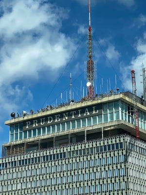 Work continues on the building of a new observation deck on the top of the Prudential Tower.