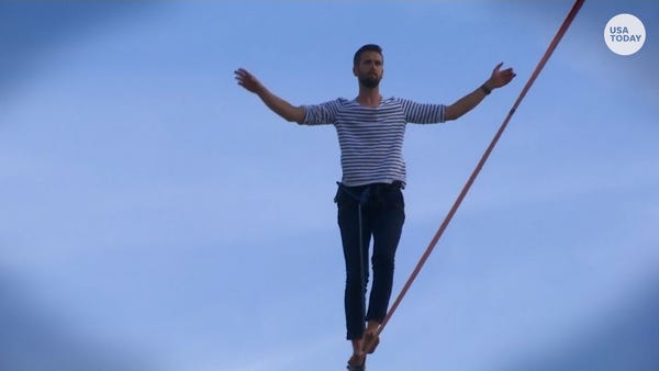 Don't look down: tightrope walker completes 2,198-