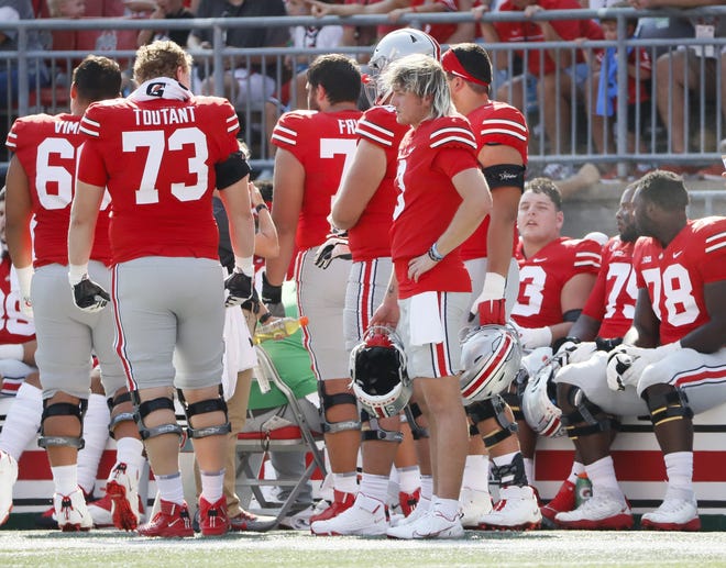 Ohio State quarterback Quinn Ewers watches from the sideline on Saturday.