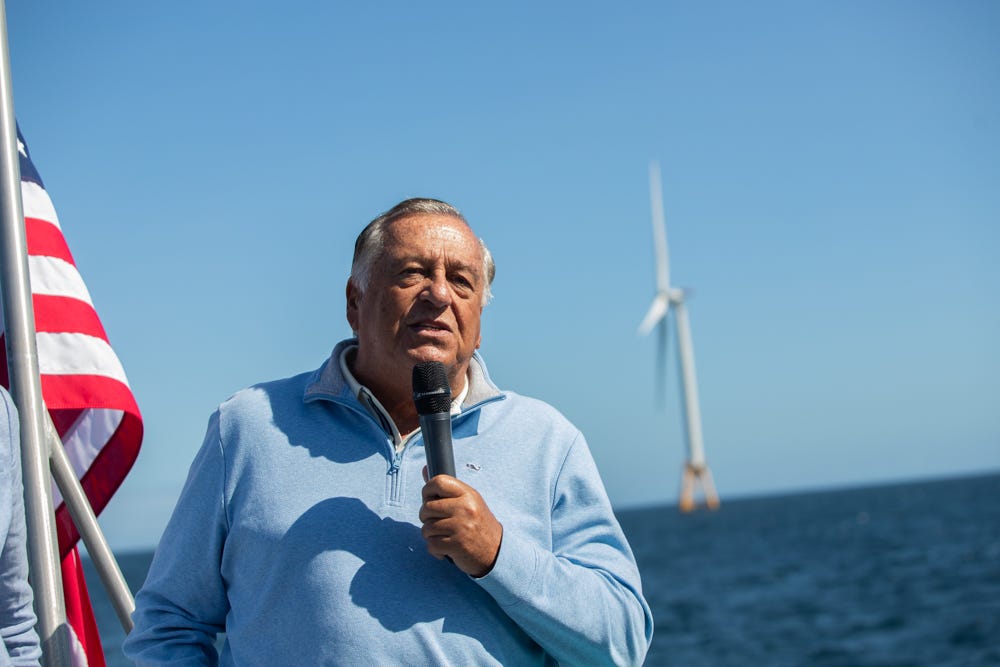 House Speaker Ronald Mariano speaks to House colleagues and wind energy advocates in September as he tours the Block Island Wind Farm located about four miles off the coast of Block Island.