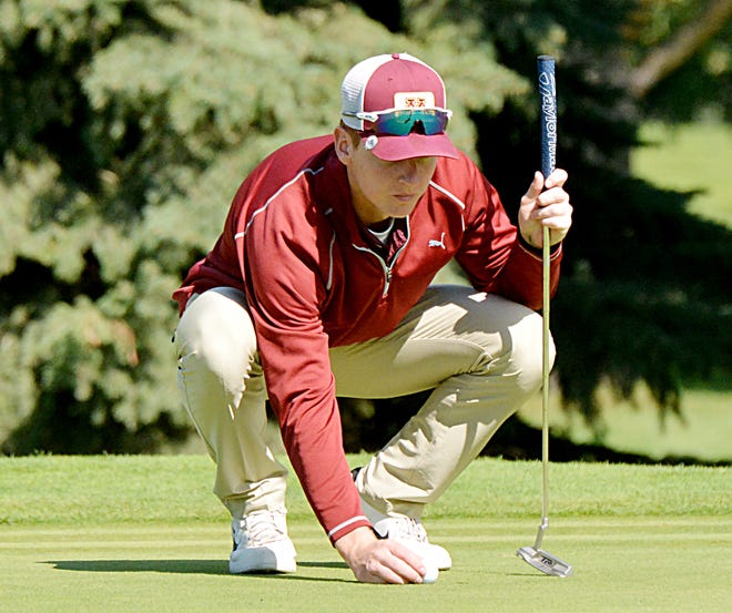 Milbank's Justus Osborn lines up a putt last fall during the Watertown Boys Golf Invitational on Tuesday at Cattail Crossing Golf Course. The South Dakota High School Activities Association voted last week on a request from Class A athletic directors regarding the number of golfers who qualify for the state tournament. Milbank is one of the area's Class A golf teams.