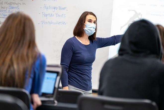 Port Huron Northern anatomy teacher Anna Jamison wears a mask while teaching a class Wednesday, Sept. 22, 2021, at Port Huron Northern High School.