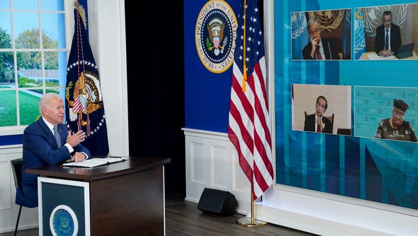 President Joe Biden speaks during a virtual COVID-