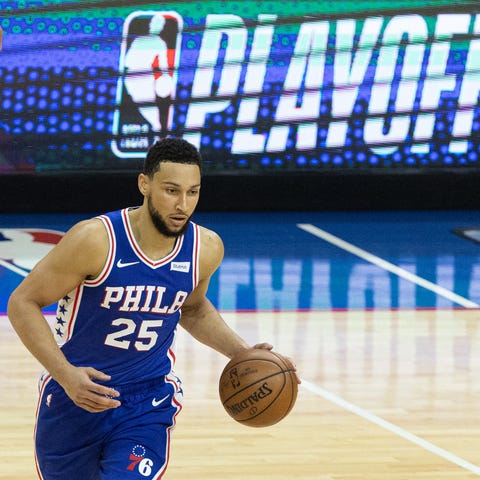 Ben Simmons (25) dribbles the ball against the Atl