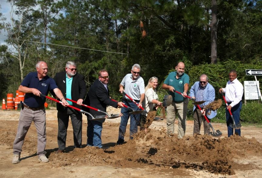 Officials from Walton County, DeFuniak Springs and the Walton County Economic Development Alliance broke ground Tuesday on a $4.7 million water and sewer improvement project along U.S. Highway 331 aimed at boosting economic development in the DeFuniak Springs and Freeport areas.