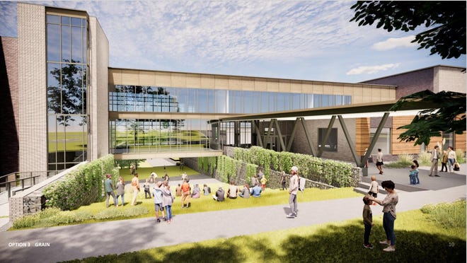The new Concord Middle School will highlight the property's natural areas and provide opportunities for outdoor learning and communal space, pictured here next to the school's front entrance.