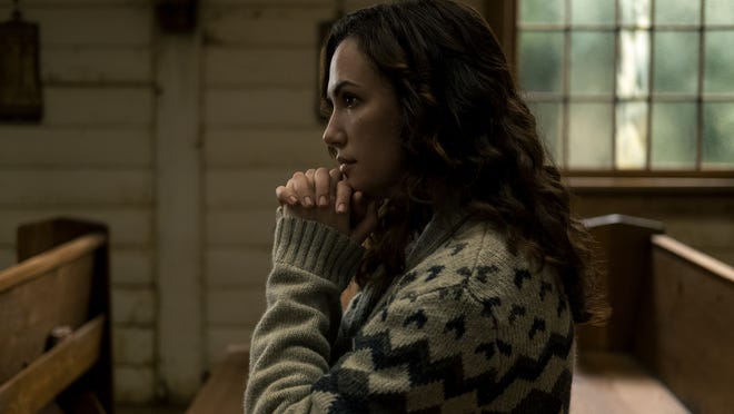 Erin (Kate Siegel) is wary of the fundamentalism that is gaining strength in her city of "Midnight Mass."