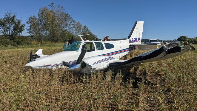 First responders gather near a 1968 Beech 95-B55 single engine plane after it crashed at the Fairfield County Airport on Friday, Sept. 24, 2021. Both occupants were transported to Grant Medical Center with injuries.