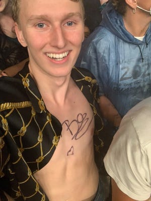 Matthew Morgan had his chest signed by Billie Eilish during her Firefly opening night set.