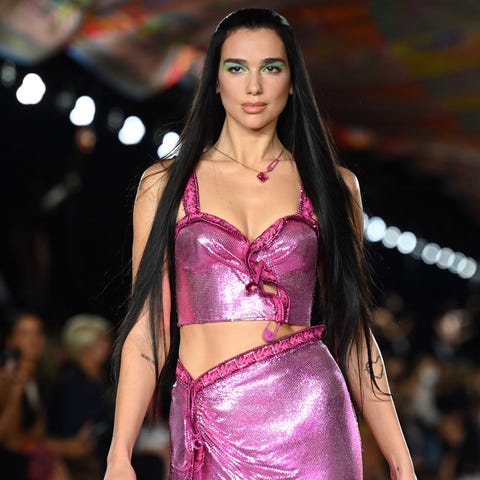 British pop star Dua Lipa rocks a fuchsia dress fr
