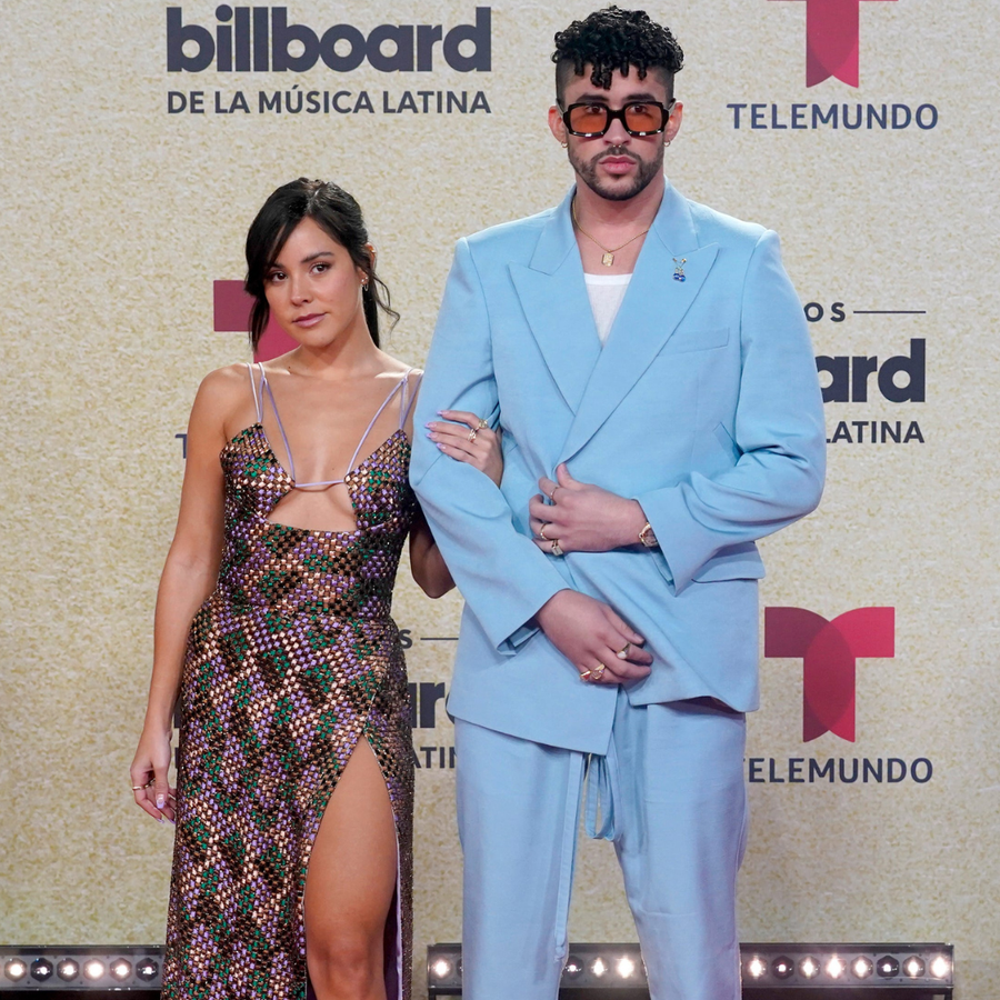 Bad Bunny, right, and Gabriela Berlingeri arrive at the Billboard Latin Music Awards on Thursday, September 23, 2021 at the Watsco Center in Coral Gables, Fla.