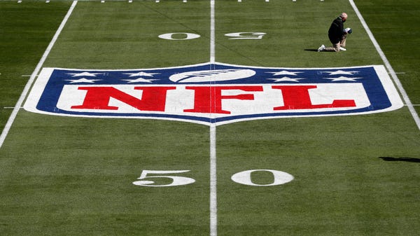 General view of the NFL Shield logo on the field b