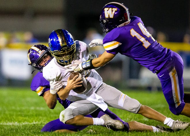 Maroa-Forsyth’s Kaiden Maurer (22) is sacked by Williamsville’s Colin Ripperda (6) on fourth down forcing a turnover late in the second half at Paul Jenkins Field in Williamsville, Ill., Friday, September 24, 2021. [Justin L. Fowler/The State Journal-Register] 