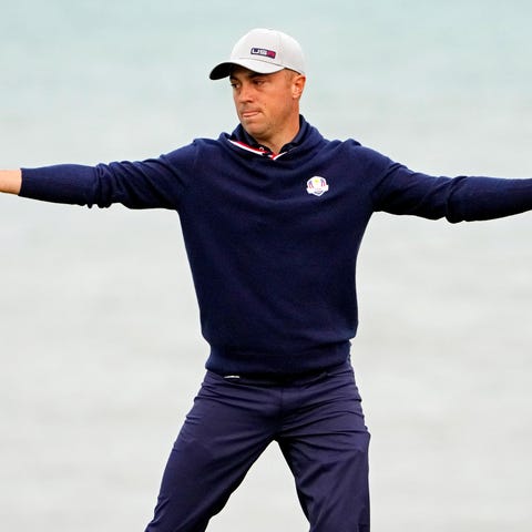 Team USA player Justin Thomas reacts to his putt o