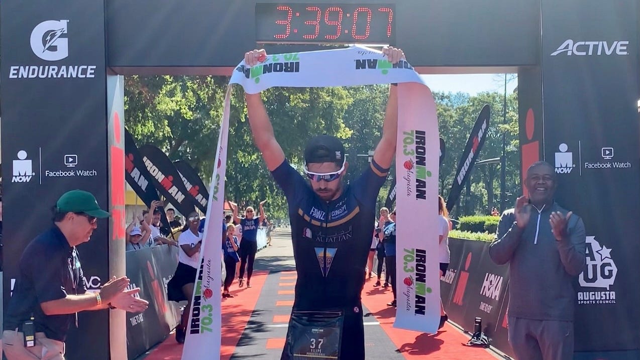 Top men, women athletes cross finish line to win 2021 Ironman 70.3 Augusta, image size:1274x717