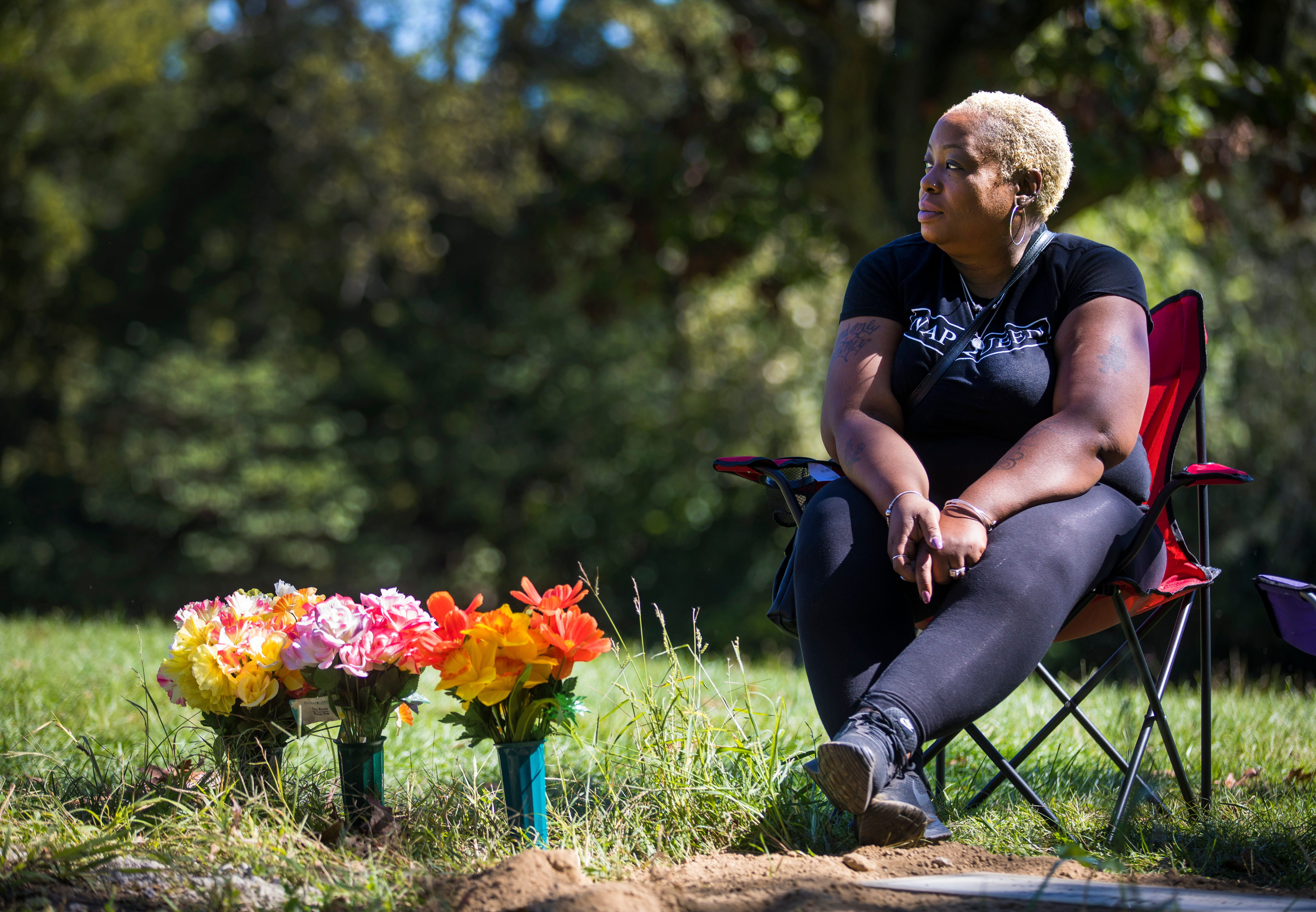 Tracey Jones visits her daughter's grave, Sept. 26, 2021. Patricia Woods, 24, was killed April 17, 2020, in what police believe was a domestic violence homicide. "How does a mom get over the death of her daughter? I just don't know how to do it."  Jones now has custody of Woods’ two children.