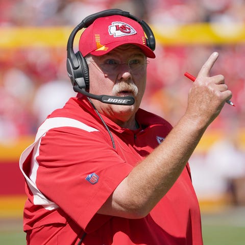 Kansas City Chiefs head coach Andy Reid motions to
