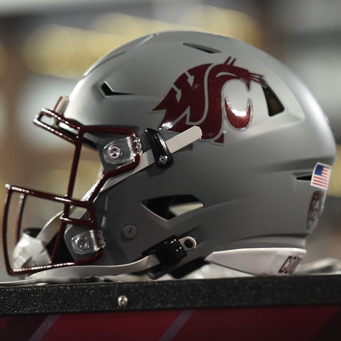 Washington State Cougars helmet sits during a game