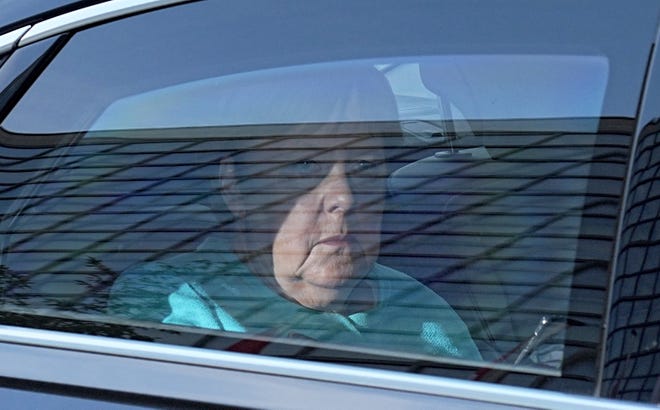 German Chancellor Angela Merkel arrives at the Konrad Adenauer House in Berlin on Sept. 26, 2021. German voters are choosing a new parliament in an election that will determine who succeeds Chancellor Angela Merkel after her 16 years at the helm of Europe’s biggest economy.